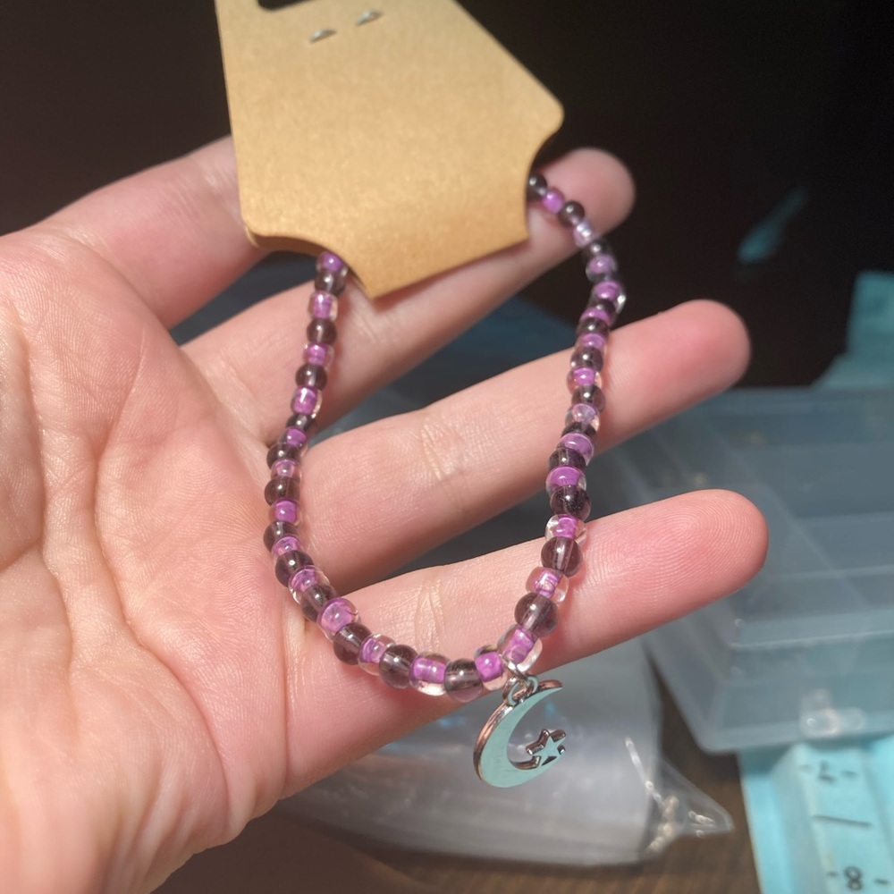Purple moon charmed bracelet beaded
